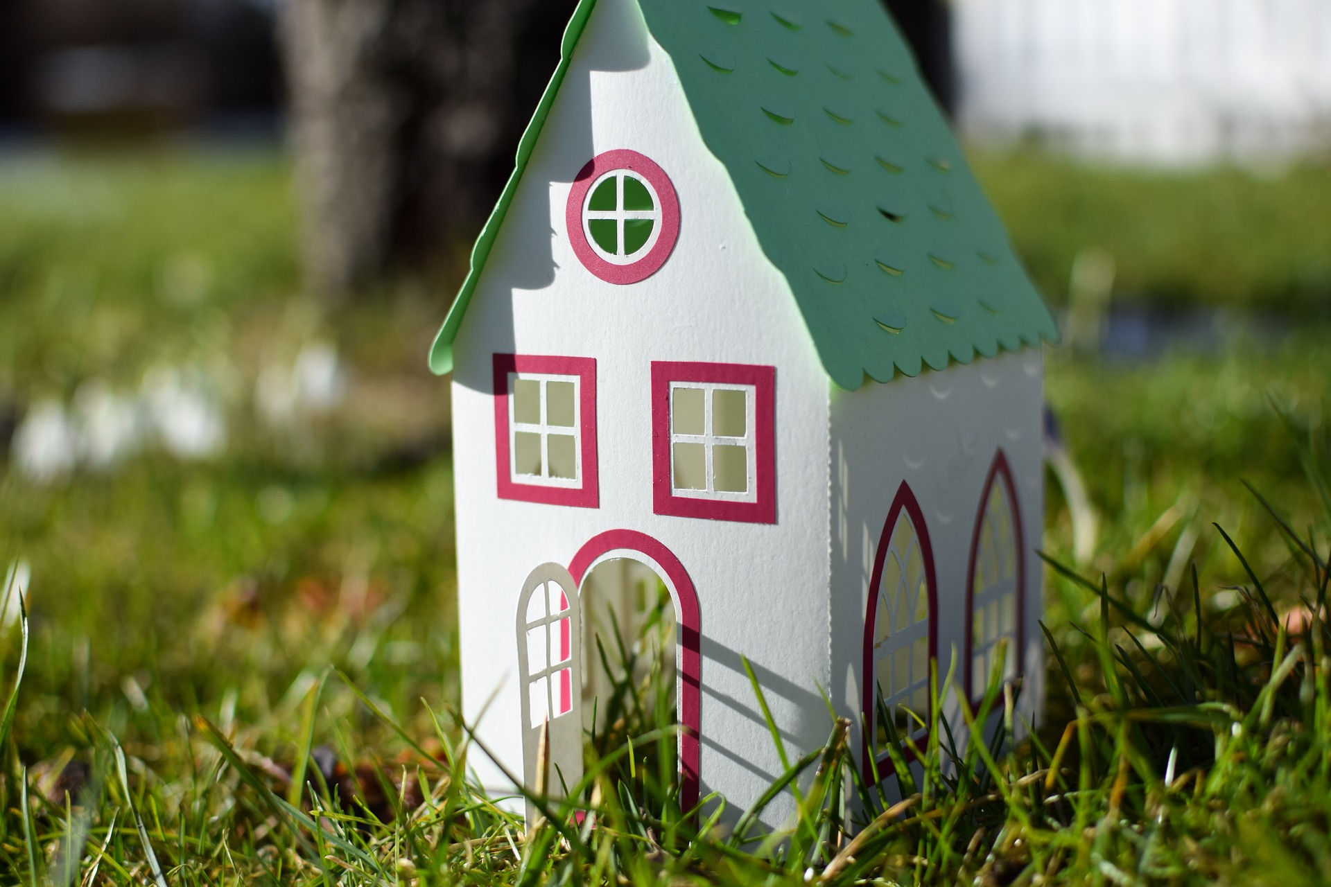 An image of a brightly coloured paper house